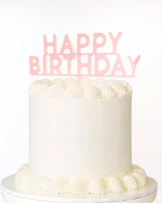 Blush pink acrylic happy birthday cake topper on cake 