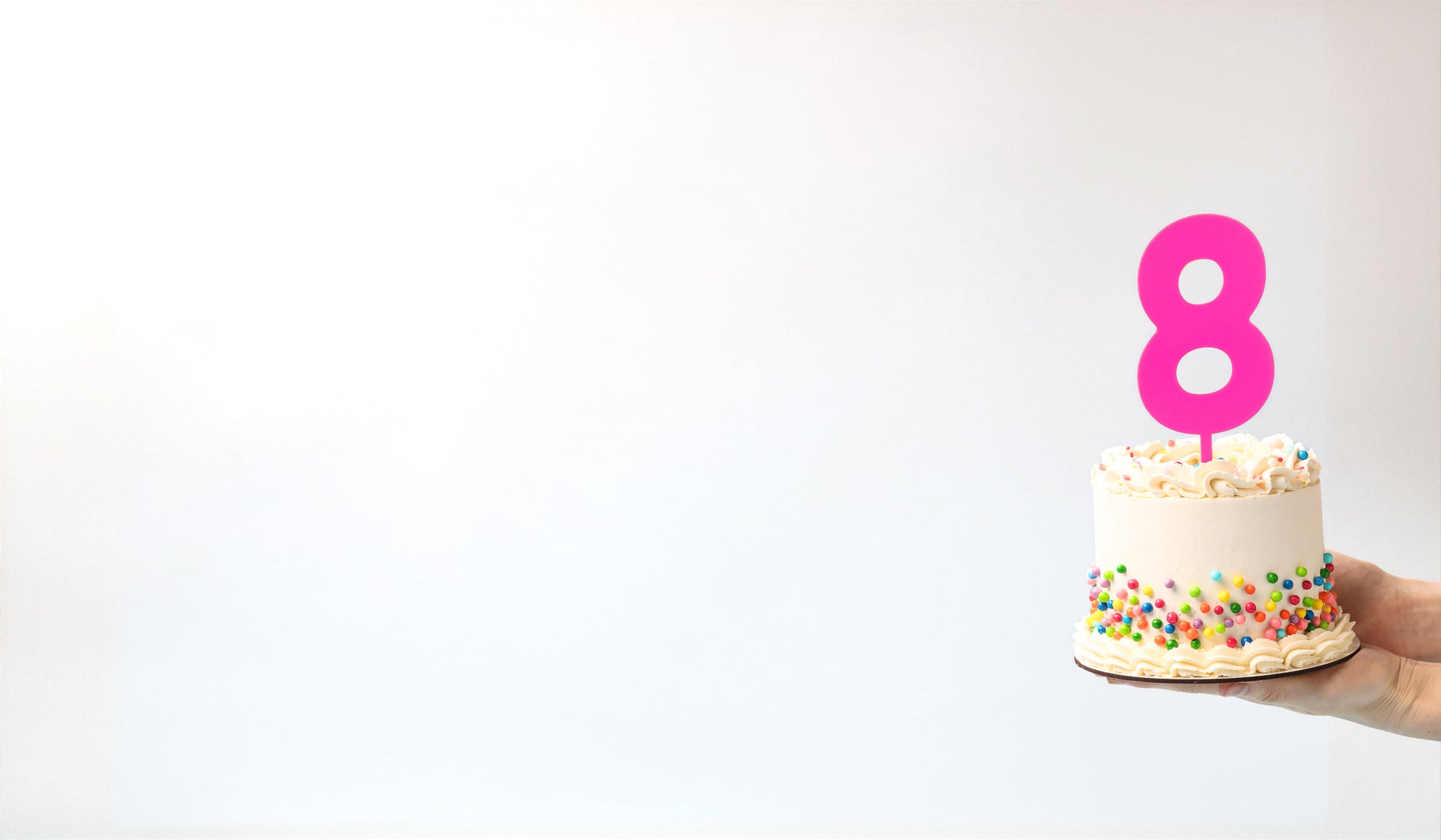 Birthday cake with a number 8 cake topper acrylic