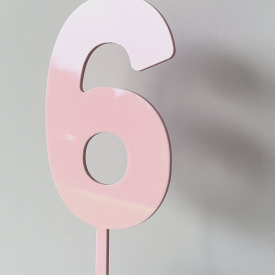 Video of blush pink number topper