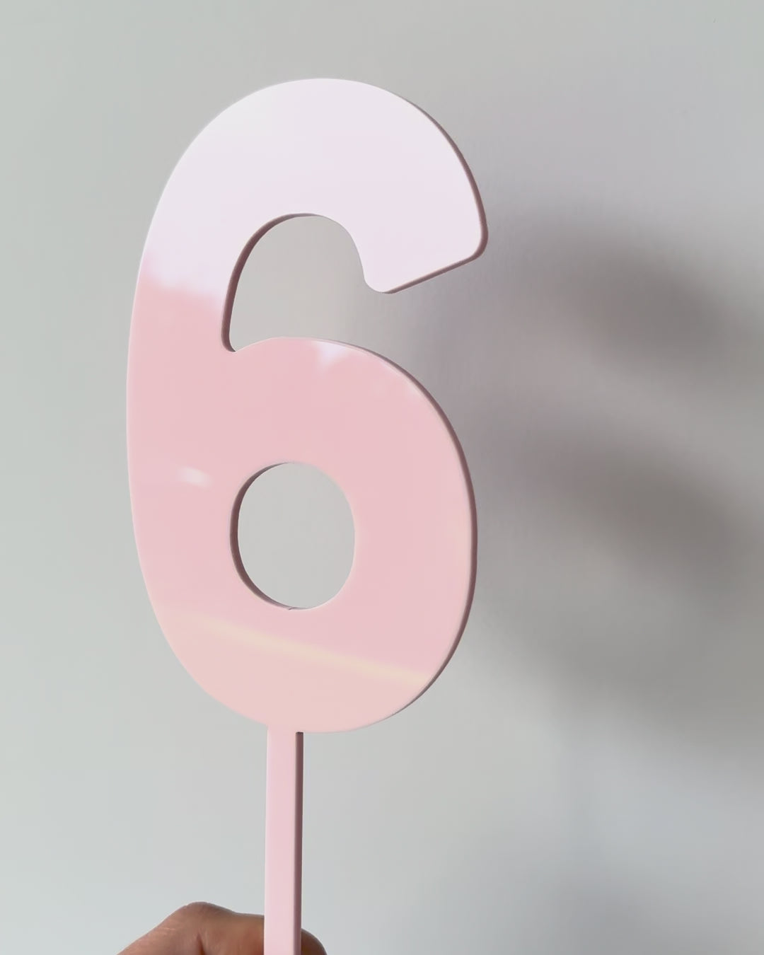 Video of blush pink number topper